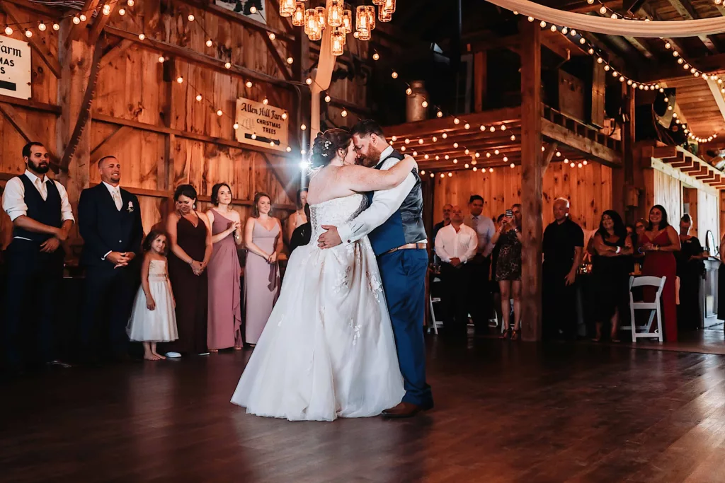 bride and groom sharing a heartfelt first dance at a ct barn wedding venue 